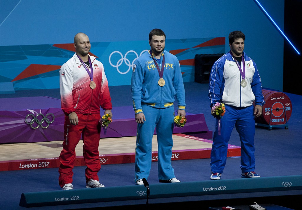 Does the bronze medalist look happier to you than the silver medalist?
