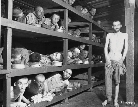 Jewish prisoners at a concentration camped. Malnutrition is evident, and one man is just skin and bones