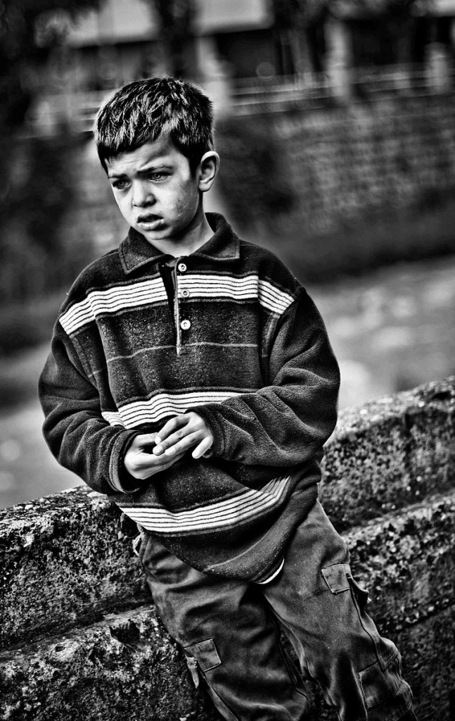 The poverty rate for US children is the highest in the Western World. Pictured is a child in poverty.