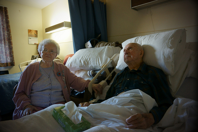 An elderly couple at a hospital together
