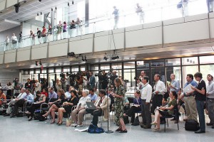 A woman speaking at a news conference