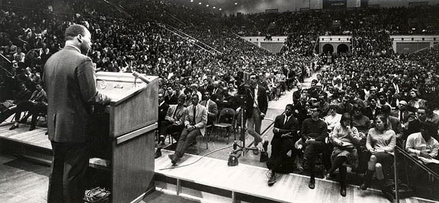 Martin Luther King Jr. speaking to a crowd at Rec Hall