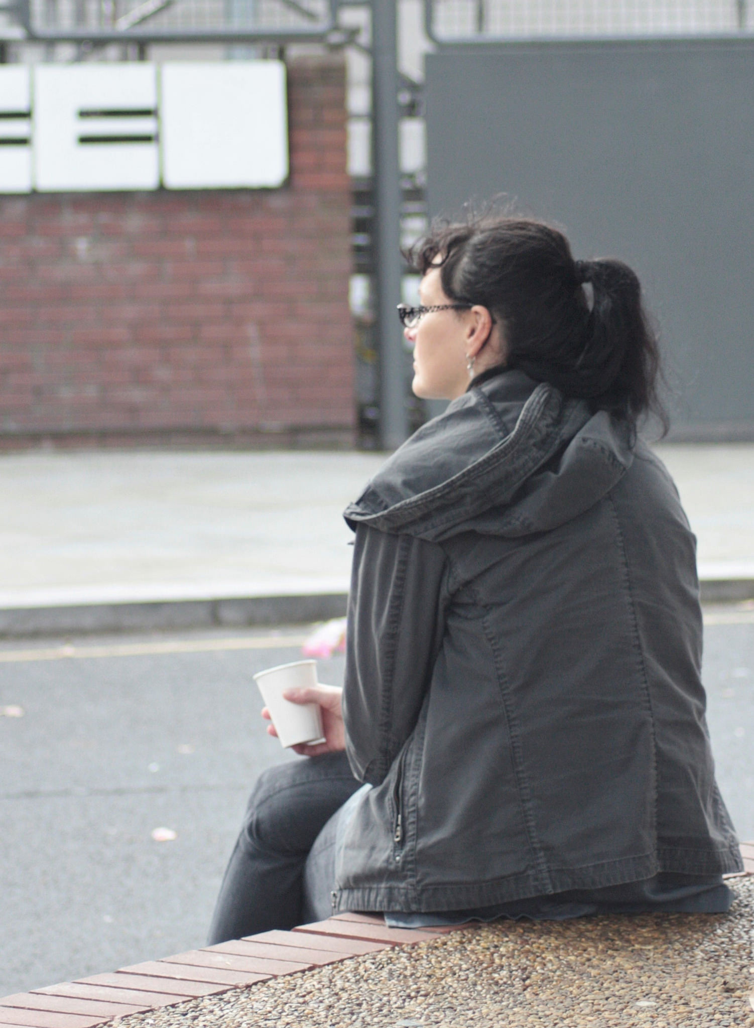 A woman looking into the distance immersed in thought