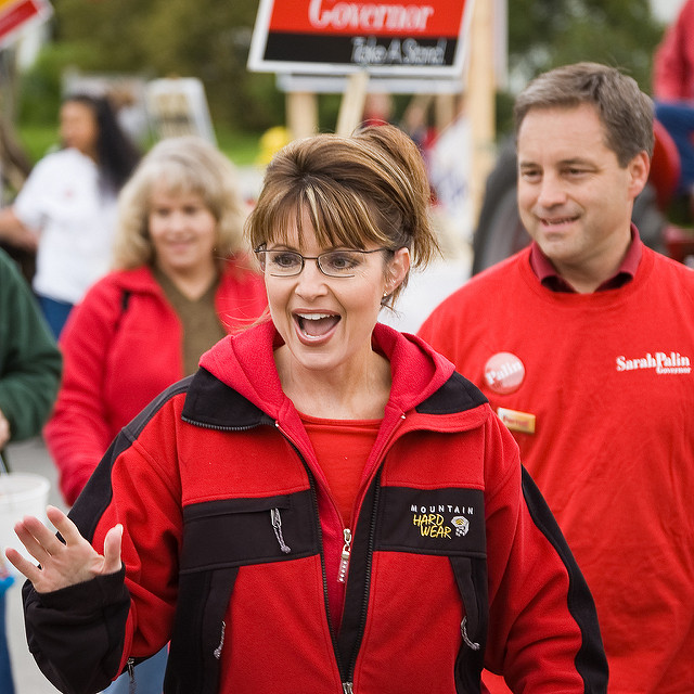 A happy Sarah Palin greeting others