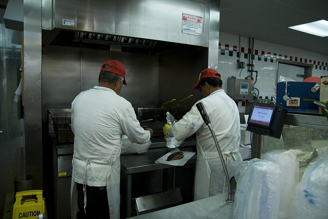 An expediter in a restaurant keeps the food flowing from the kitchen to the diners in a timely and orderly fashion, just as the expediter in a group keeps the group on an agenda.