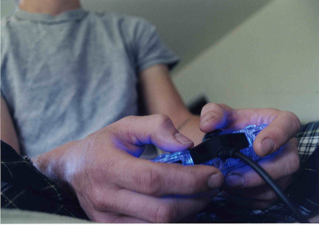 Person playing video game.