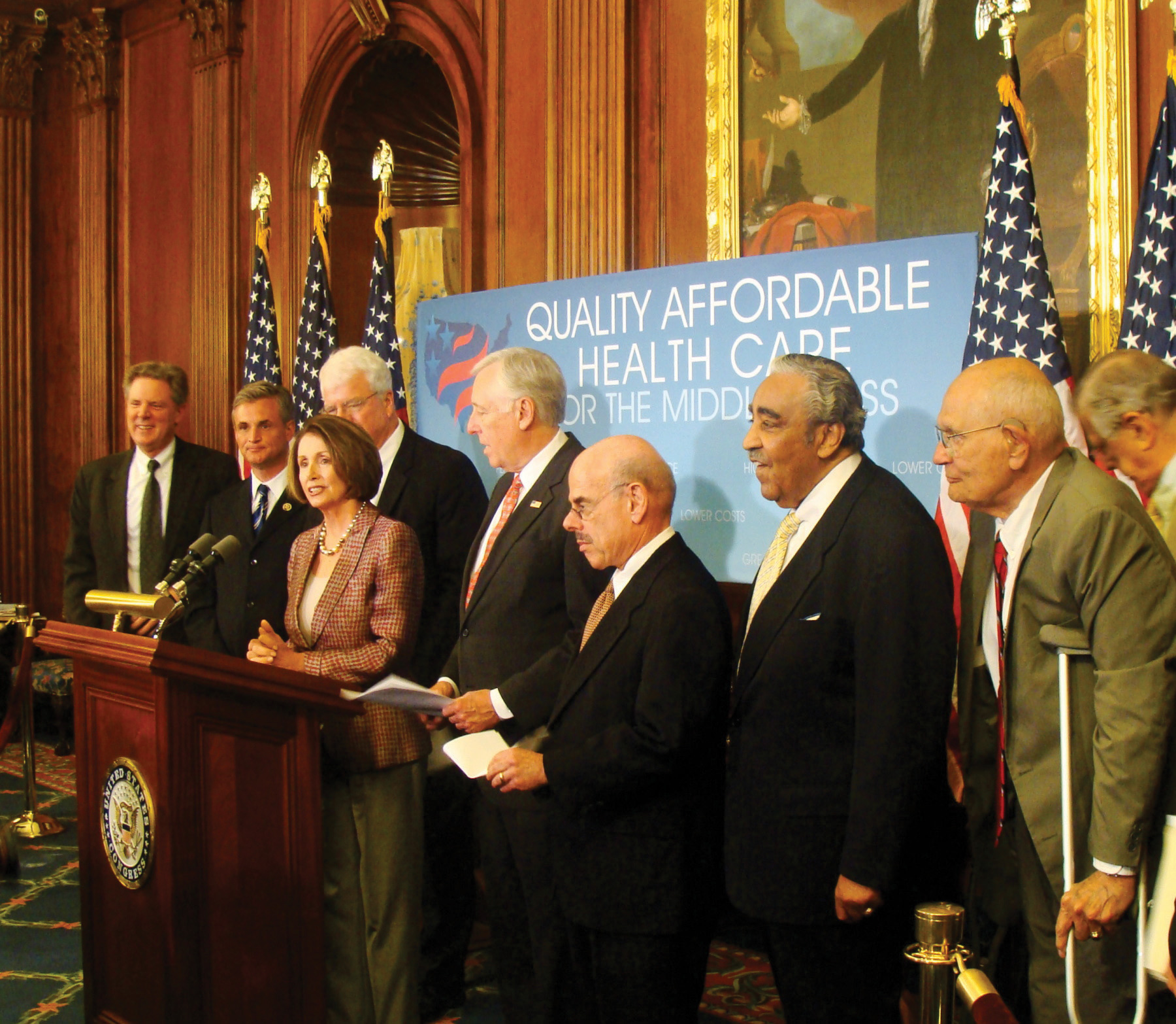 Nancy Pelosi with members of the House or Senate introducing bills.