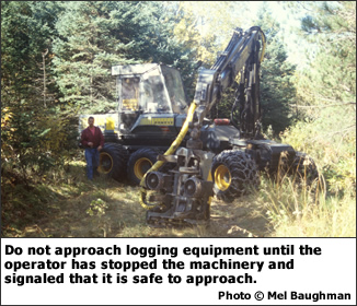 Do not approach logging equipment until the operator has stopped the machinery and signaled that it is safe to approach.