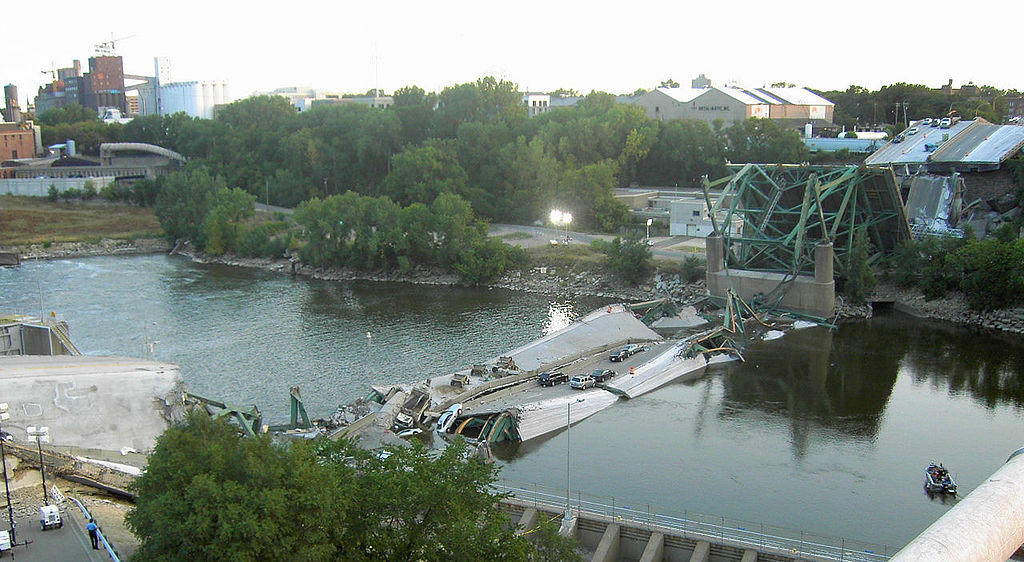 An image of the August 1, 2007, I-35 bridge collapse in Minneapolis, MN, which was widely characterized as a structural engineering failure. https://www.engineeringcivil.com/minneapolis-i-35w-bridge-collapse-engineering-evaluations-and-finite-element-analysis.html