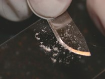 white skin samples shown on scalpel