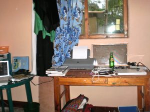 A desk with computer equipment.