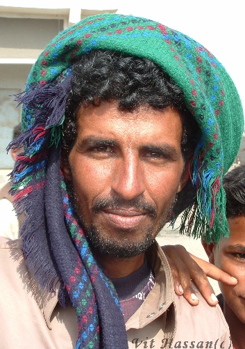 A middle-eastern man wearing a turban