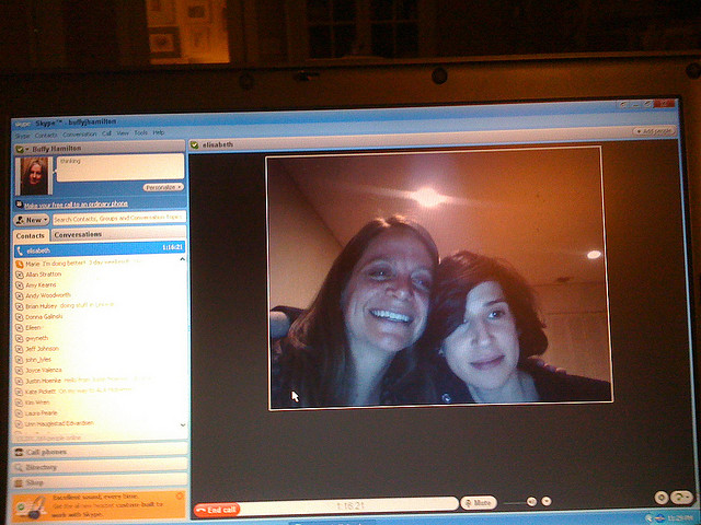 Friends using Skype to communicate